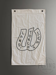 Sample custom cotton logo flag on natural canvas